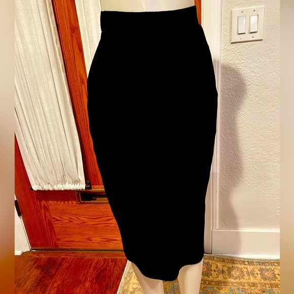 Dresses & Skirts - Black suede skirt. Fully lined excellent condition.